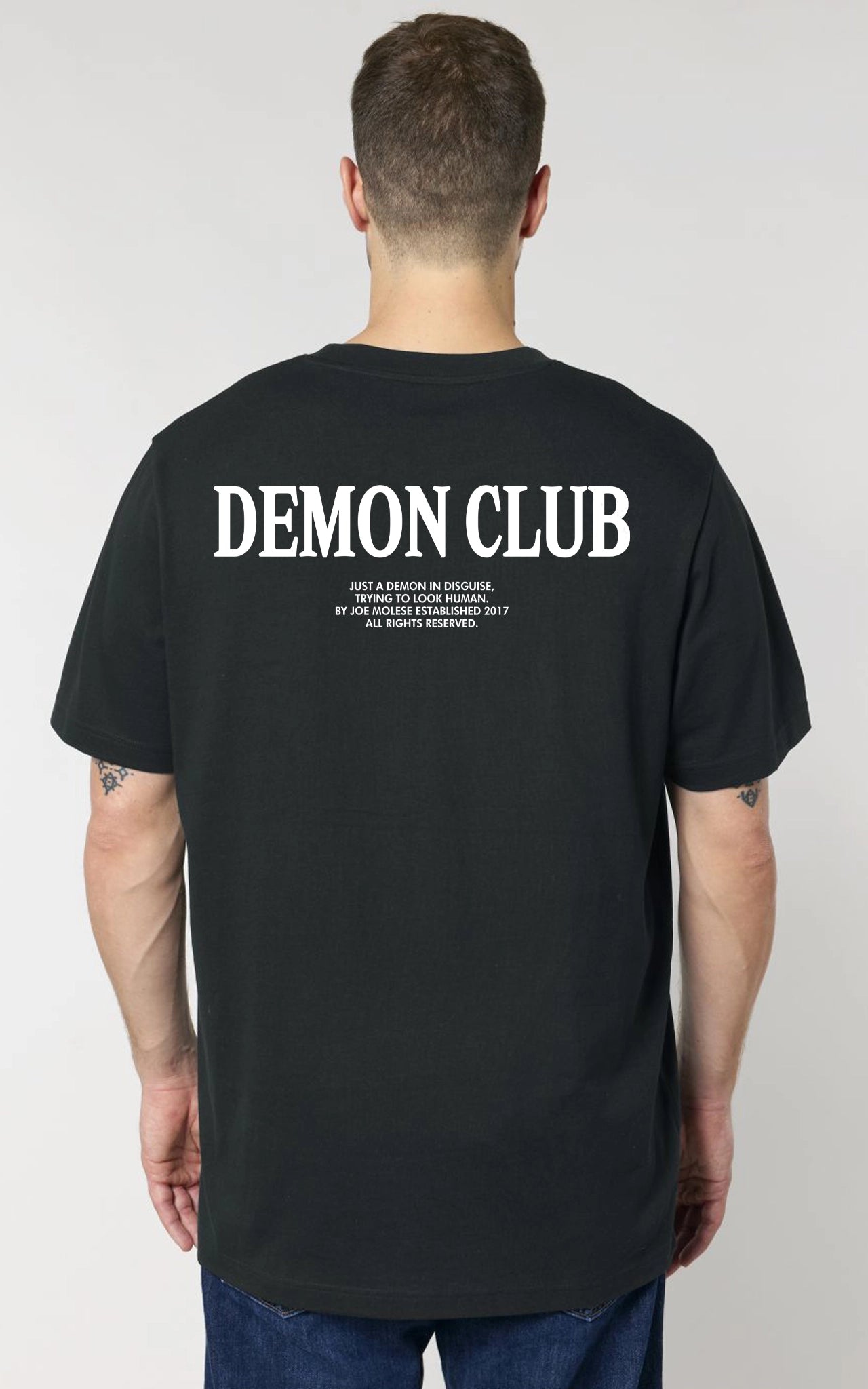 Exklusives Demon Club Tee mit kraftvollem Motiv hinten